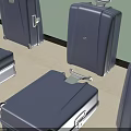 Blue Suitcases In Different Sizes With Wheels And Handles Against Light Green Wall