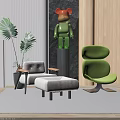 Modern Green Accent Chair with Beige Chair Ottoman Palm Plant and Wooden Decor on Rug
