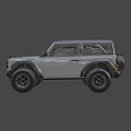 Rugged Off Road Vehicle with Black Roof Yellow Headlights Large Tires and UK License Plate