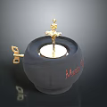 Black Decorative Candle Holder With Golden Figurine Top And Red Alone Text