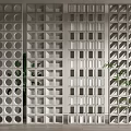 White Modern Room Dividers Featuring Circular Holes And Square Grid Patterns 3d model