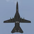 Military Camouflage Fighter Jet Flying Through Clouds With Weapon Pylons