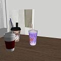 Three Beverage Cups on Wooden Table with Coffee Iced Purple Drink Cream Topping and Sprinkles