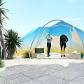Window Display Decoration with Two Dressed Mannequins Palm Trees and Geometric Patterns