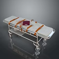 Medical Stretcher With Wheels Brown Straps And Red Item On Mattress