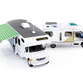 Two Modern RVs With Green Awning Solar Panels And White Exterior Design