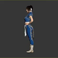 A Woman in Blue Martial Arts Outfit with Double Ponytail and Hands on Hips
