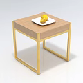 Stylish Coffee Table With Wooden Top And Golden Metal Frame Featuring White Plate And Lemon