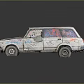 Old White Station Wagon Car Covered With Colorful Graffiti And Worn Paint