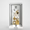 Chanel Brand Window Display Decoration With White Architectural Model Gold Gift Boxes And Black Bows