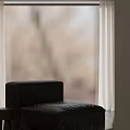 Modern Cozy Open Dining And Living Room With Large Window And Comfortable Lounge Furniture