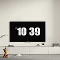 White Modern TV Stand in Living Room with TV Decorative Items and Plant