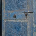 Pair of Vintage Blue Wooden Doors with Carved Patterns and Distressed Finish