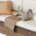 Cozy White Sofa With Beige And White Pillows Striped Dog Toy And Blanket