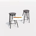 Modern Metal Bar Stools With Round Seats And Black Frame Design