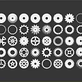 Assorted Industrial Gears And Mechanical Parts With Various Sizes And Shapes