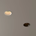 Two Recessed Spotlights Mounted on Ceiling One Illuminated One Unlit
