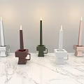 Stylish Modern Geometric Candle Lamps In Multiple Colors On Marble Tabletop
