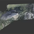 Open Pit Mine Structure With Terraced Layers Green Vegetation And Access Roads