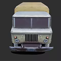 Vintage Green And Yellow Truck With Large Tires And Rustic Exterior Design