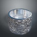 Elegant Silver Ring with Intricate Woven Pattern and Metallic Shine for Fashionable Look
