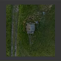 Old Wooden Windmill with Stone Pedestal on Green Grassland and Path