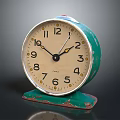 Vintage Green Alarm Clock With Cream Dial Numeral Markings And Rustic Base