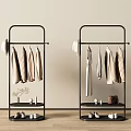 Black Metal Clothes Racks with Hanging Coats Dresses Shoes and Bags on Shelves