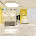 Divinefit Clothing Store With Bright Yellow White Decor And Mannequins Displaying Outfits