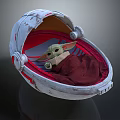 Baby Alien in White Red Detailed Pod Wrapped in Red Blanket Holding Small Object