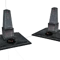 Stone and Wood Monument Structures with Square Bases and Small Flower Beds