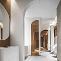 Modern Minimalist Public Toilet Design With Arched Doors Mirrors And Clean White Beige