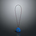 Elegant Blue Pendant With Gold Pattern Hanging On Black Cord Design