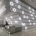 Rebel Café Modern Interior With Circular Light Rings Open Space And Bright Counter Design