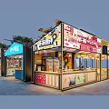 Vibrant Commercial Street With Colorful Food Stalls And Outdoor Dining Areas