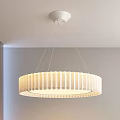 Modern Circular White Striped Pendant Light Hanging In Contemporary Interior