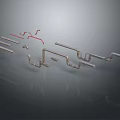 Various Metal Pipes With Elbows And Red Connectors On Reflective Surface