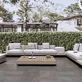 Modern Outdoor Sofa Set With Wooden Coffee Table And Green Plant Backdrop
