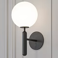 Modern Style Wall Light with White Spherical Lampshade and Black Pole Mounted on Indoor Wall