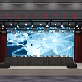 Modern Conference Room With Auditorium Seating Large Screen And Red Curtains