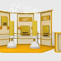 Interactive Zone With Yellow Fencing Punching Bags And Blue Signage