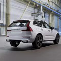 White Volvo SUV With Modern Design And Black Wheels In Spacious Industrial Hall