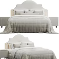 Modern Beige Double Bed With Curved Headboard Plush Pillows And Nightstand