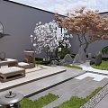 Rockery Stones In Modern Courtyard Garden With White Flower Tree And Stone Path