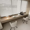 Modern desk and white chair set with laptop books and table lamp by window