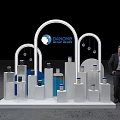 WORLDCOLOUR Art Installation with White Arch Structures Blue Accents Display Stands Cans Person in Suit