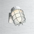 White Wall Lamp With Green Metal Cage Mounted On White Brick Wall