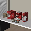 Red Kitchen Appliances Including Coffee Makers On White Countertop With Jars And Box