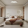 Modern Bedroom Interior Featuring Beige Bed Brown Blanket Round Mirror And Window Plant