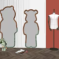 Stylish Bear Shaped Mirrors for Interior Decor with Mannequin and Green Accents
